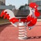 Bouncy colorful spring playground equipment; plastic rooster on