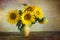 Bouquet of beautiful sunflowers in a vase