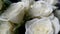 Bouquet of beautiful white roses close. Delicate flower petals and leaves. Wedding bouquet for the celebration. A gift