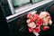 Bouquet bride door retro car black rain drops