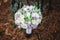 Bouquet bride with purple flowers