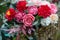 Bouquet of bright colourful colours made from soap in basket of old vintage bike