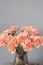 Bouquet of carnation flowers peach color. Spring background. Clove bunch present for Mothers Day.