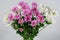 Bouquet of chrysanthemums on a light gray background. Background of flowers