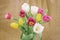 Bouquet of colorful tulips, bright flowers close-up. Concept of spring, holidays and gifts