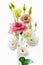 Bouquet of coloured small flowers isolated on white background