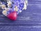 bouquet of cornflowers, chamomile holiday summer heart, on a wooden background