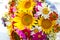 A bouquet of daisies, sunflowers and other beautiful bright flowers