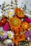 Bouquet of dried colorful flowers in front of light background