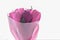 A bouquet of flowers from colored corrugated paper in the form of tulips with a candy inside. Gift, a sign of attention for a