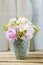 Bouquet of flowers: peony, matricaria and serruria florida blushing bride