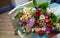 A bouquet of flowers on the table.Rainbow Daisies. Chrysanthemum Rainbow Flower. Bouquets of blossom rainbow Chrysanthemum . multi