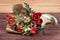 Bouquet of flowers with tulips, chamelaucium and eucalyptus on wooden table. high quality