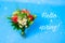 A bouquet of flowers in a vase. Different colors. A bouquet. Blue background. Plants and flowers . Hello spring banner. New season