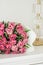 Bouquet of fresh cut pink tulips in an elegant interior, home decor