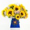 A Bouquet of Fresh Sunflowers in a Hand-decorated Cardboard Box.