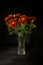 Bouquet of garden flowers marigolds in a glass vase