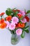 Bouquet of gerberas. Pink, orange and red gerbera in a vase.