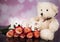 A bouquet of haber roses and a teddy bear mascot. Valentine`s Day