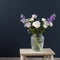 Bouquet of hackelia velutina, purple and white roses, small tea roses, matthiola incana and blue iris in glass vase opposite on