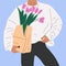 Bouquet hand holding tulips. March 8 Valentine\\\'s Day