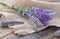 bouquet of lavender flowers on piece of fabric on table