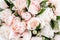 Bouquet of a lot of peonies of pink color close up. Flat lay, top view. Peony flower texture.