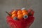 Bouquet of mandarins and Christmas tree branches. New Year`s edible bouquet of fruits. Gift for Christmas. DIY gift