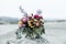 Bouquet of Mums, Eucalyptus, and LIlacs on a Stone Rock at Half Moon Bay, California