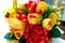 Bouquet of paper flowers of yellow color and red berries for congratulations on the day of knowledge autumn
