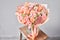 Bouquet Peach and orange color. Beautiful bunch mixed flowers in wooden table. the work of the florist at a flower shop