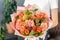 Bouquet Peach and orange color. beautiful hydrangea flowers in a vase on a table . Decoration of home. Wallpaper and