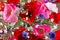 Bouquet of red and pink poppy and blue cornflower top view. Flowers background