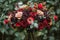 Bouquet of Red and Pink Roses With Greenery