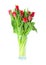 Bouquet of red tulips in a clear vase