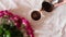 Bouquet of roses close-up in vase against rustic wooden background. Beautiful festive floral card with copy space for