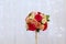 Bouquet of roses in a vase on the background of a silk curtain