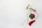 Bouquet of snowdrops on white background with red and white rope and lalybug. First of march celebration Martisor.