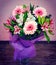 bouquet of spring flowers - white and pink Alstroemeria and gerberas with green leaves in gentle pink tones