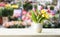 Bouquet of spring tulips pink and yellow in a white ceramic vase. Congratulations on Mother\\\'s Day, Easter, March 8