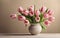 Bouquet of spring tulips pink and yellow in a white ceramic vase. Congratulations on Mother\\\'s Day, Easter, March 8