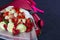 Bouquet of strawberries, roses and flowers