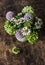 Bouquet of summer flowers of hydrangeas, daisies on a wooden background, top view