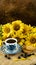 A bouquet of sunflowers on a dark background in a rustic style. A white anblueberries and cookies d blue cup