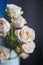 Bouquet of tender creamy roses in vase