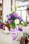 Bouquet in a vase. Purple and white flowers. The concept of a pa
