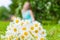 Bouquet of white daisies meadow lies on green grass