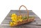 Bouquet of yellow lilies Citronella in a basket