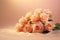 Bouquet of yellow peach roses on light fabric close-up with copy space on apricot background