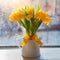 Bouquet of yellow tulips sunlight rays after rain on the windowsill.